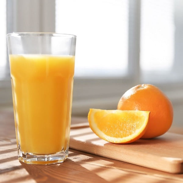 Fresh Valencia oranges from Sharbatly in a 5 kg carton, ideal for juicing, showing vibrant orange fruit stacked neatly.